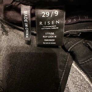 Black Risen distressed skinny jeans.